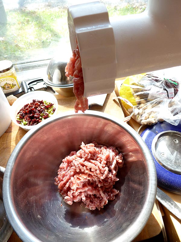 Grinding the forcemeat for the roulade