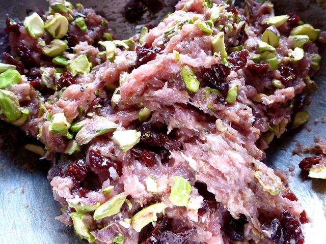 The ground duck and pork with a smattering of chopped pistachios and cherries