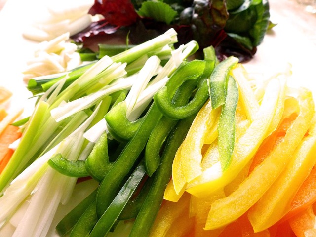 Slicing veggies and aromatics for japchae noodles