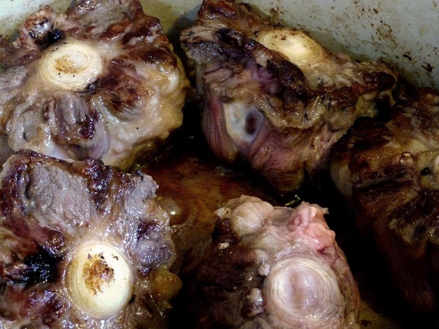 Oxtails undergoing the Maillard reaction, aka `browning,' vital to achieving maximum beefy deliciousness