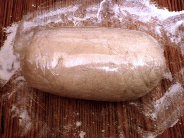 A fat sausage of suet pastry wrapped in cling film