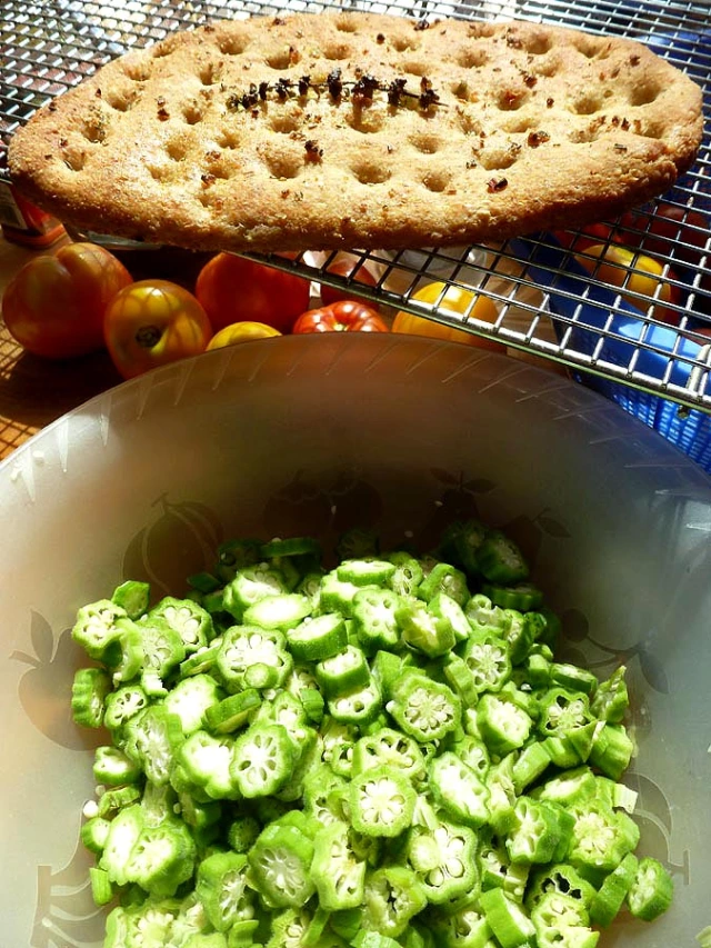 Sliced okra and a cooling garlicky naan bread
